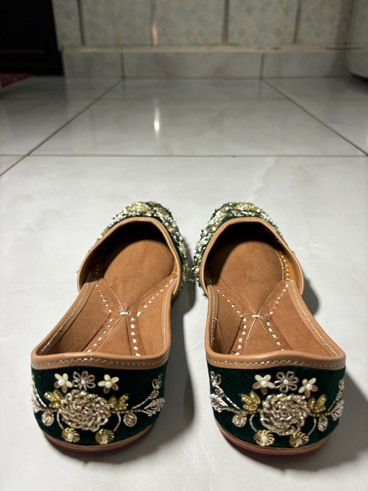 Emerald Green Hand-Embroidered Juttis with Pearl & Zari Work