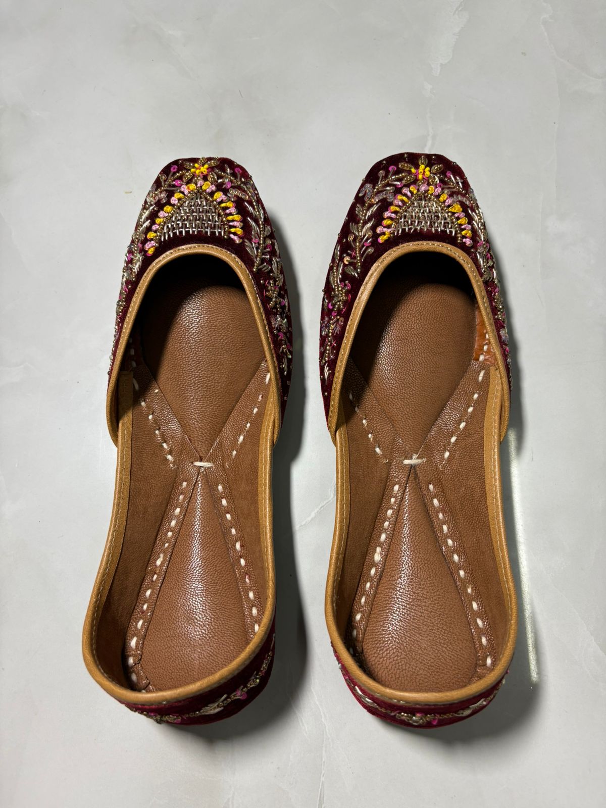 Maroon Velvet Juttis with Multicolor Zari and Sequin Embroidery