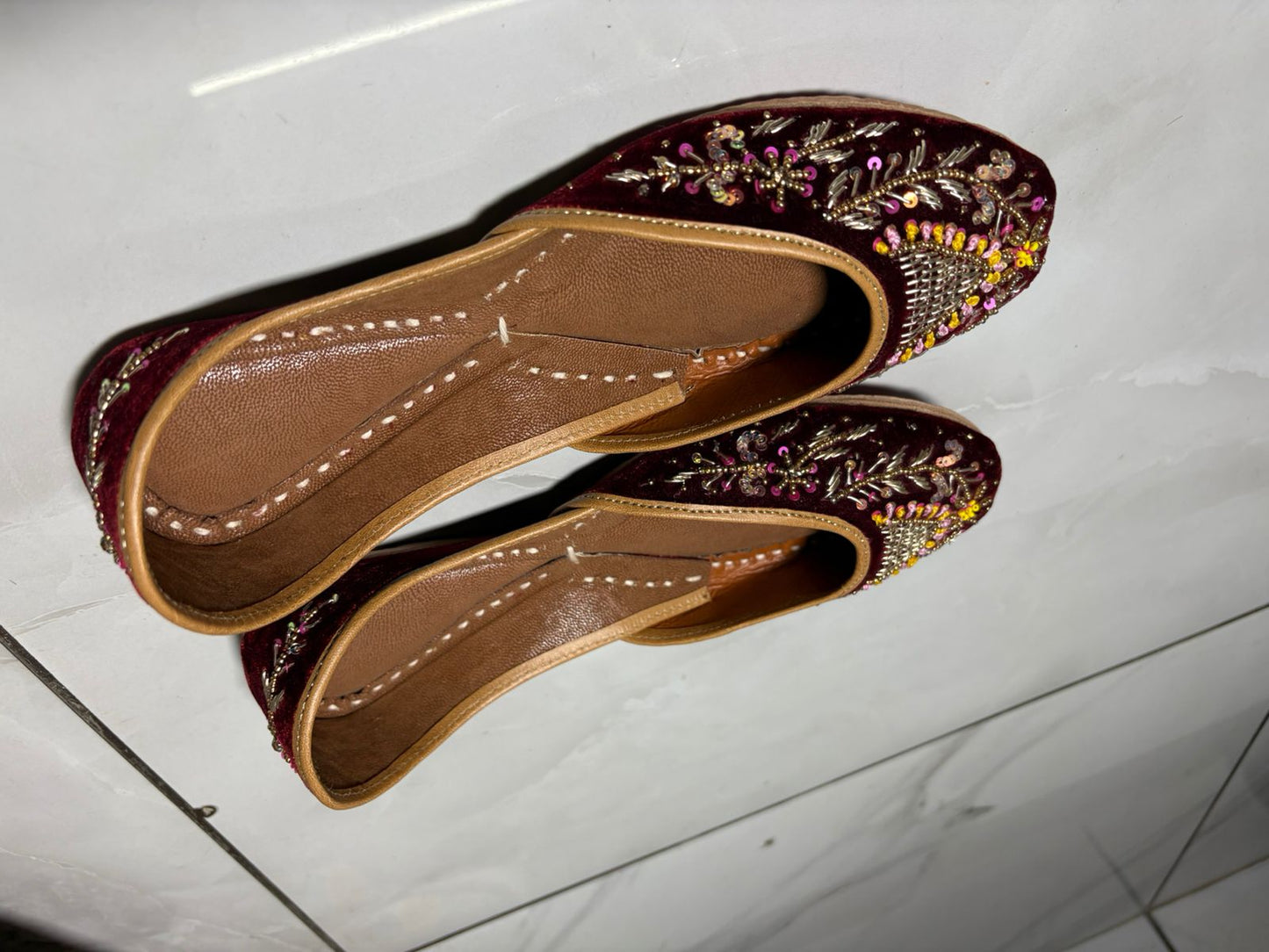 Maroon Velvet Juttis with Multicolor Zari and Sequin Embroidery
